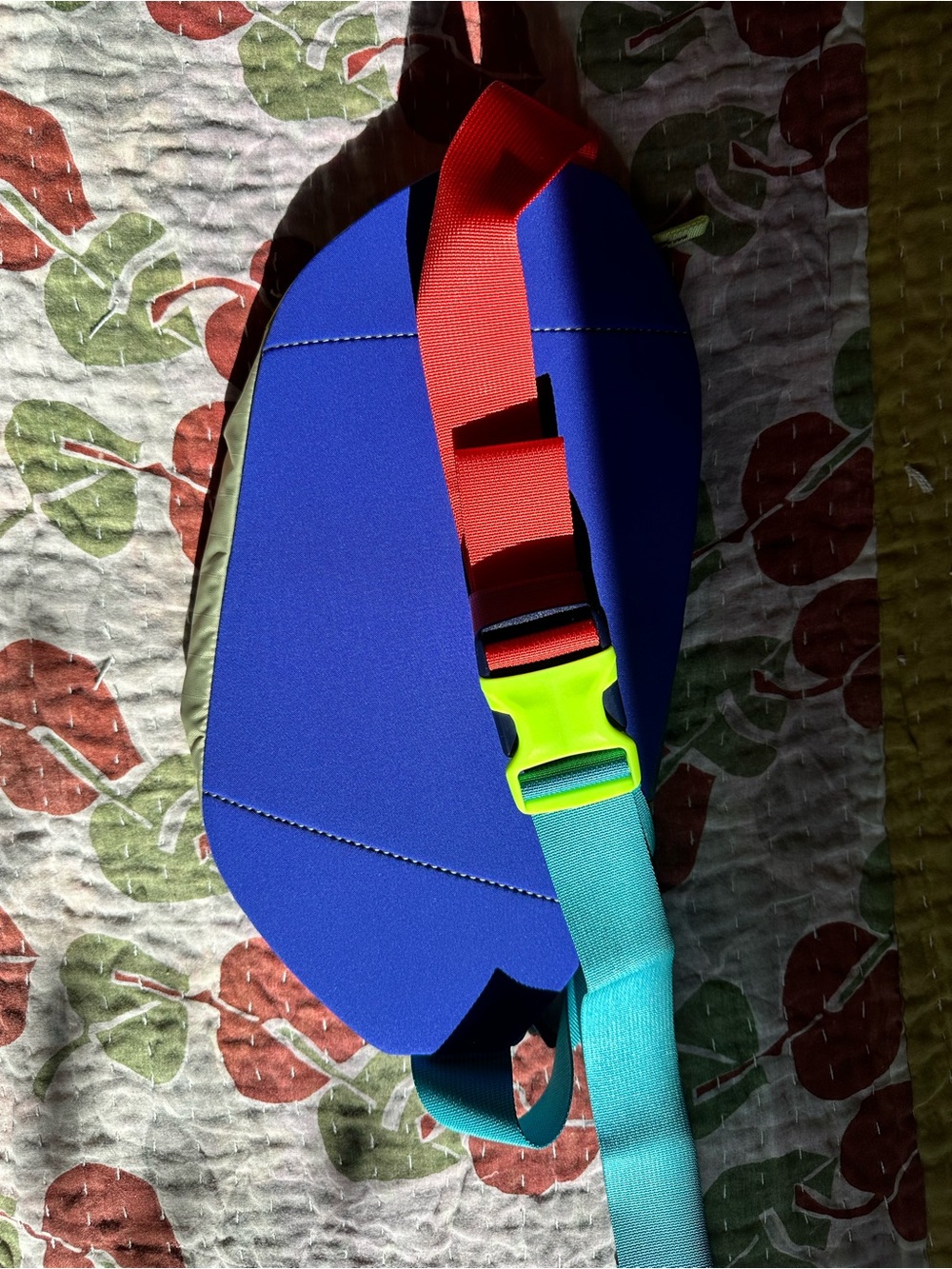 Cotopaxi colorful waist pack with teal, neon yellow, red and blue accents - Picture 3 of 3